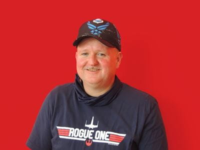 Headshot of Steve Savage, Raymond Employee, and air show volunteer.
